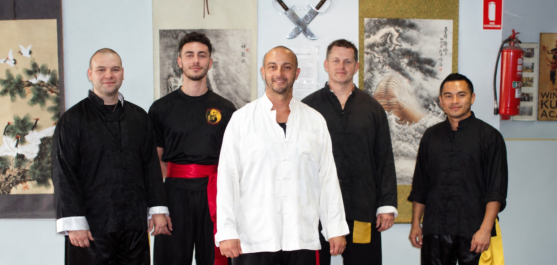 Five Wing Chun Universe instructors standing together