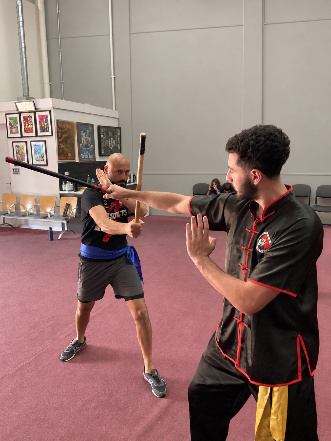 A Wing Chun instructor guiding a student during private training